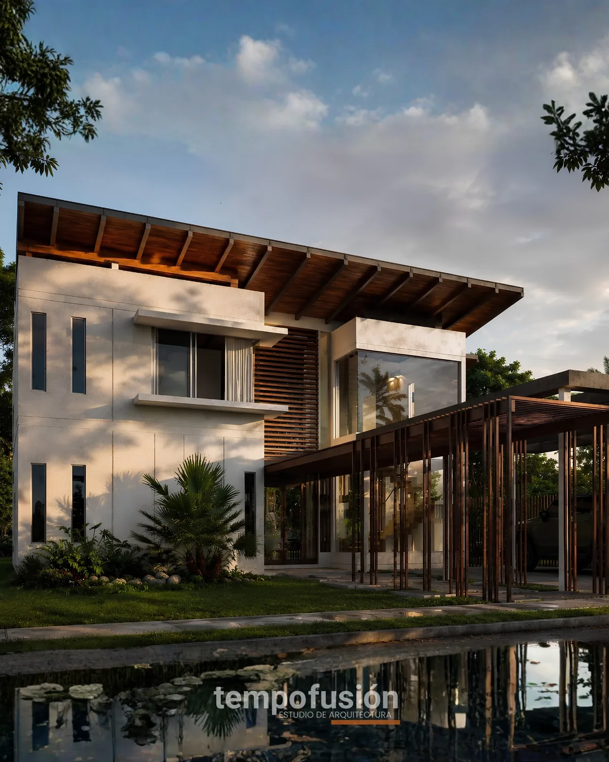 Vivienda contemporánea con aleros de madera y espejo de agua